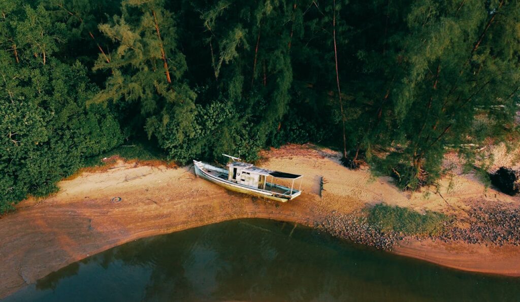 mini drone - aerial shot of boat stranded